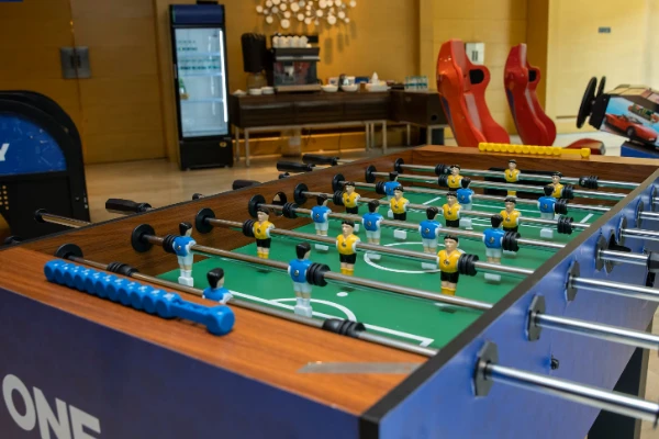 Arcade games on rent in Chennai air hockey, foosball, racing simulator, claw machine